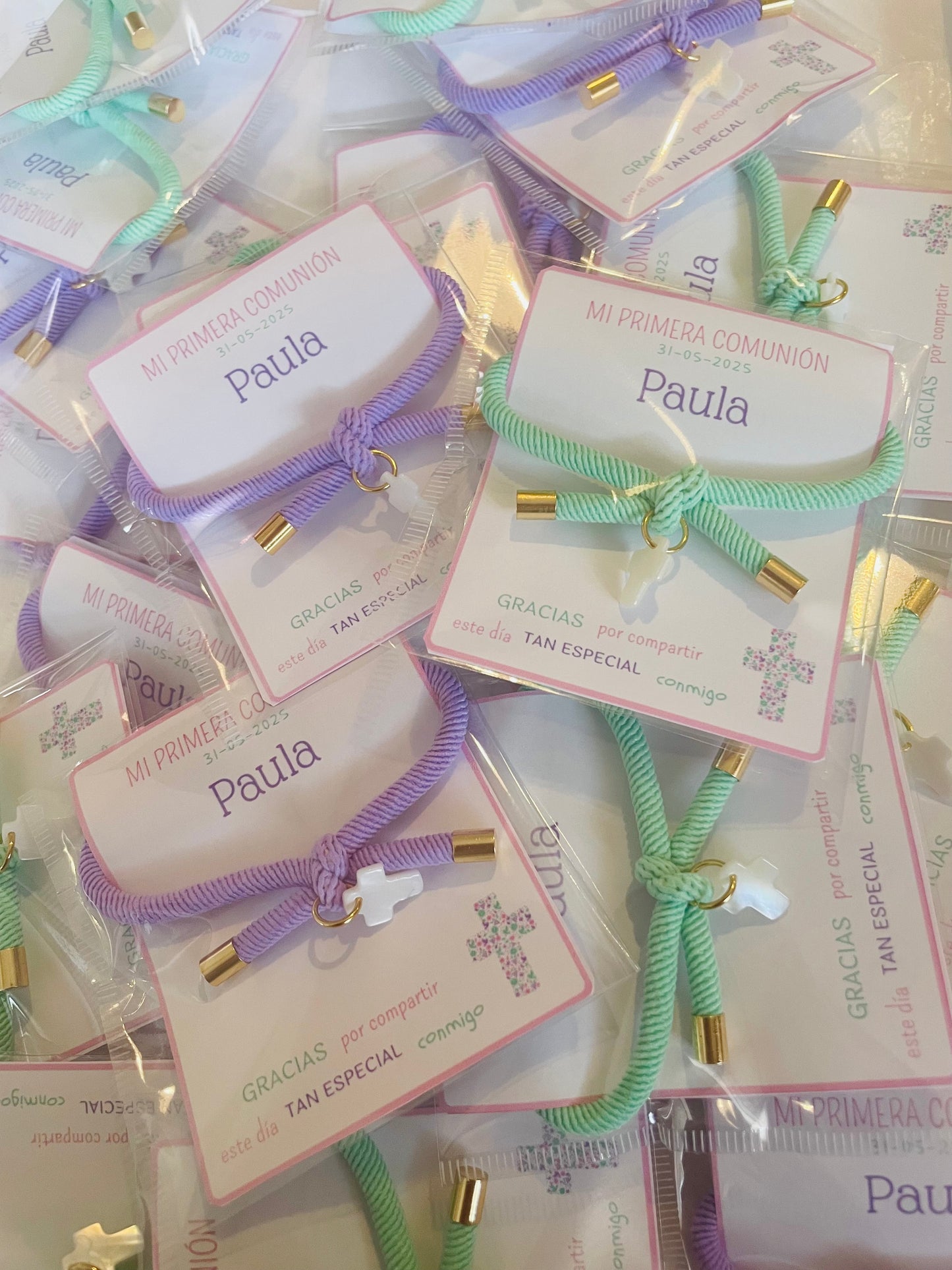 Pulsera solidaria nudo cruz nacarada comunión