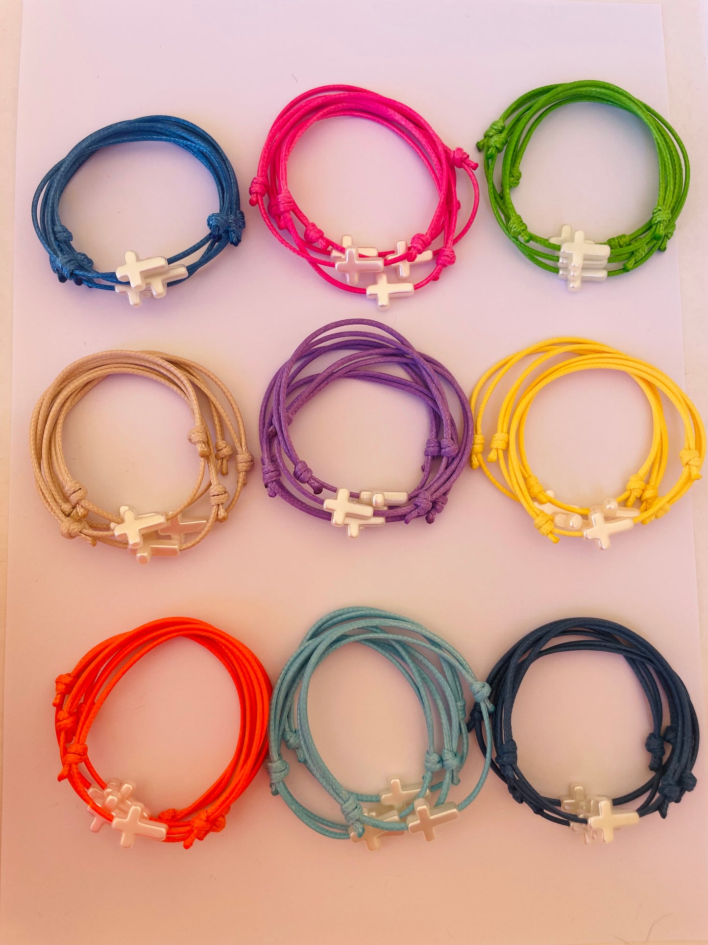Pulsera Cruz comunión solidaria