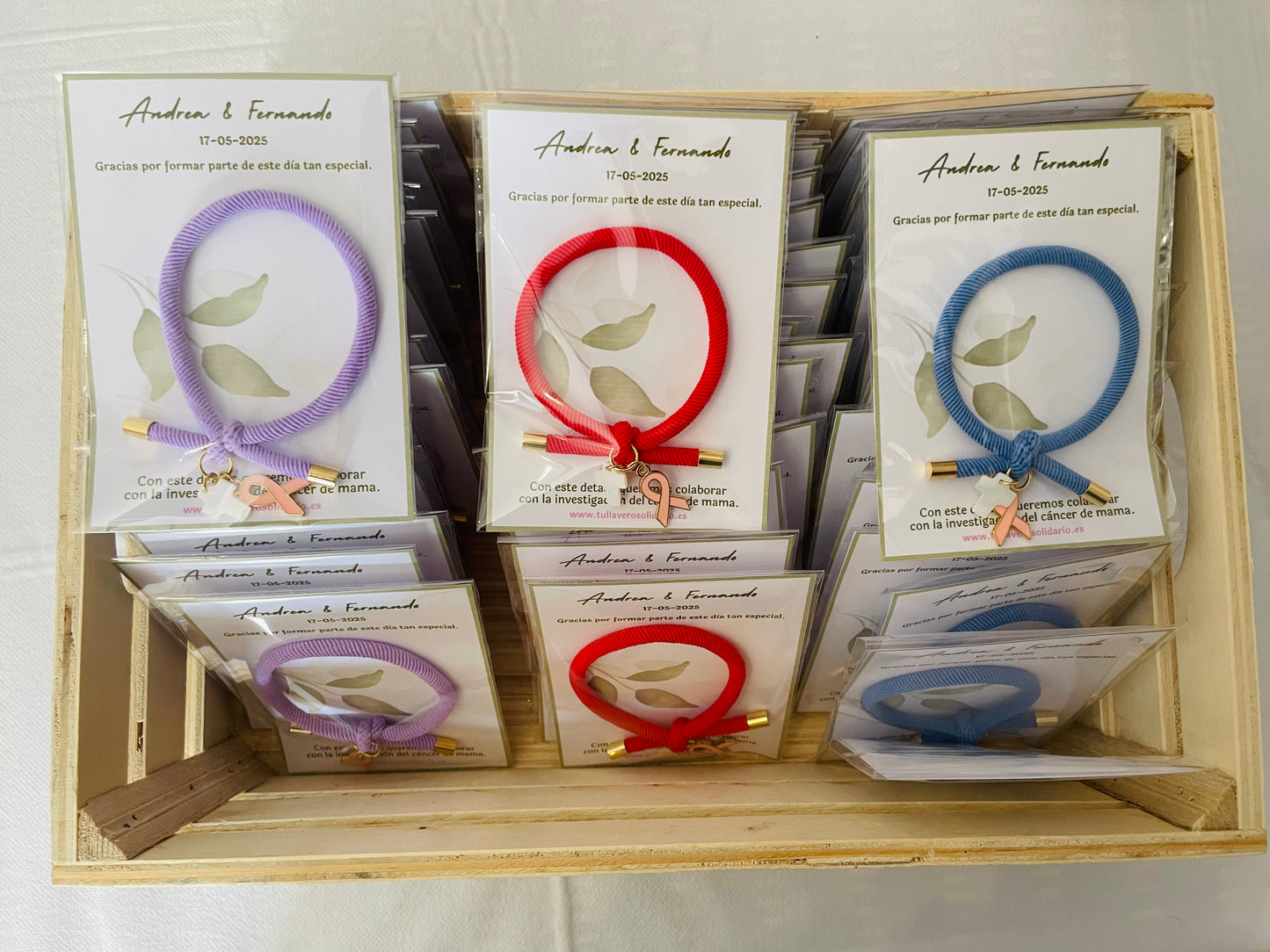 Pulsera solidaria nudo cruz nacarada comunión