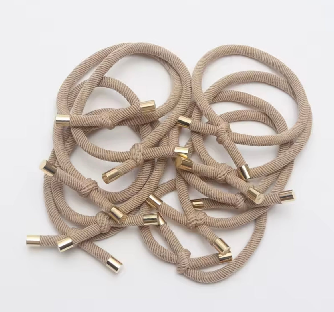 Pulsera nudo zapatillas