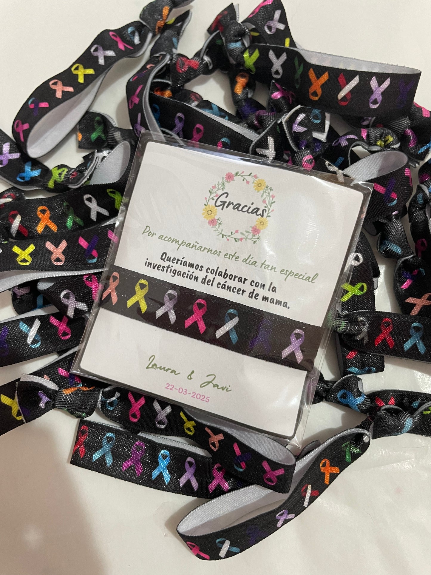 Pulsera solidaria cáncer de mama