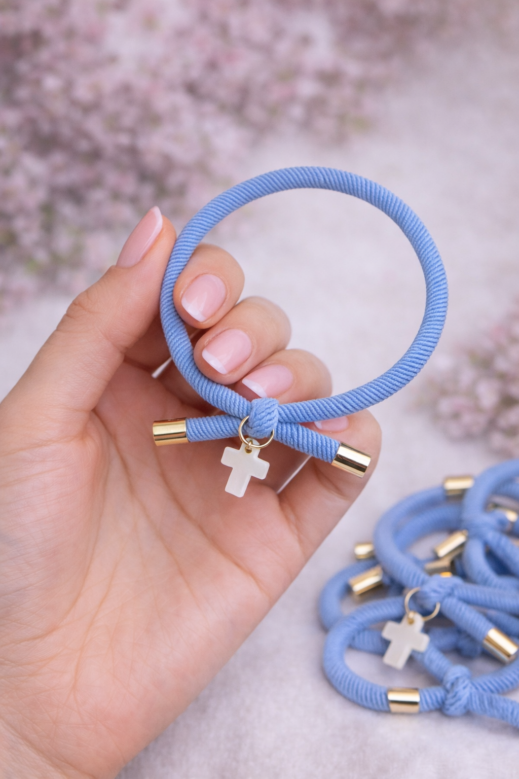 Pulsera solidaria nudo cruz nacarada