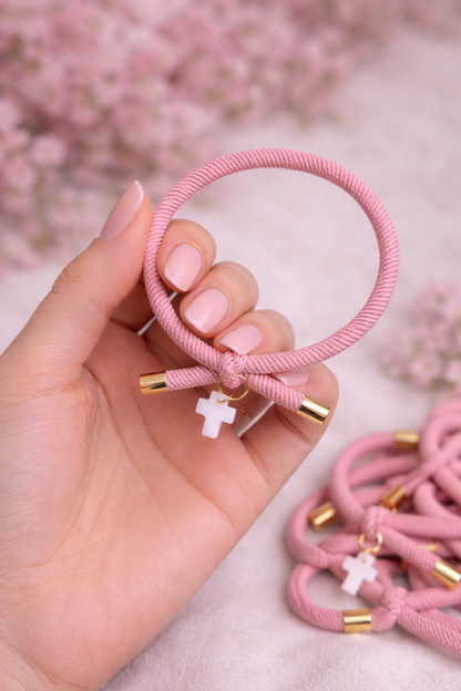 Pulsera solidaria nudo cruz nacarada