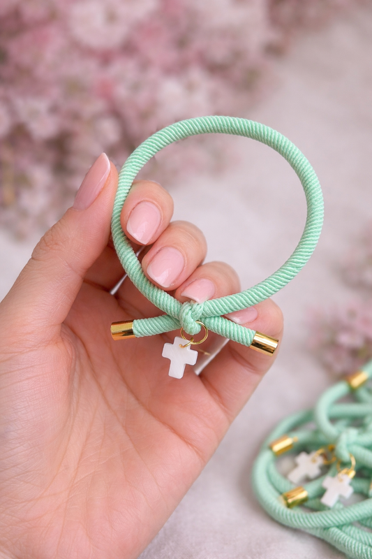 Pulsera solidaria nudo cruz nacarada