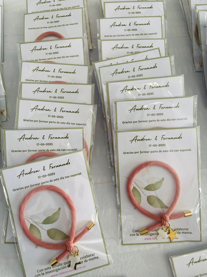 Pulsera solidaria nudo cruz nacarada comunión
