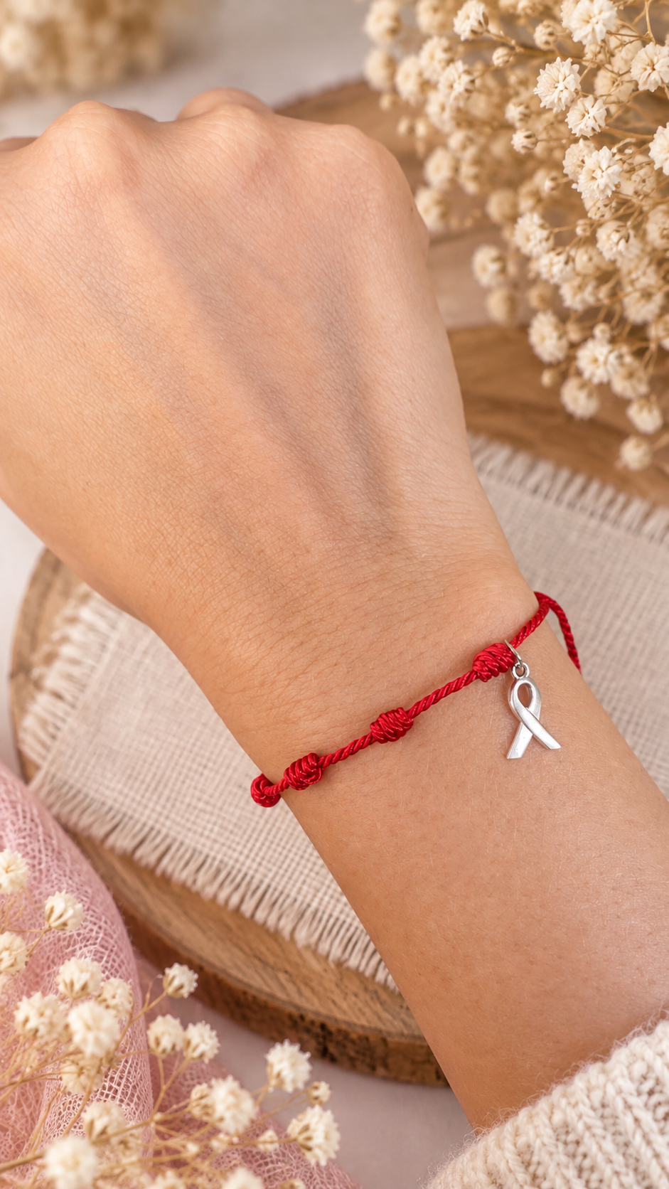 Pulsera roja de los 7 nudos