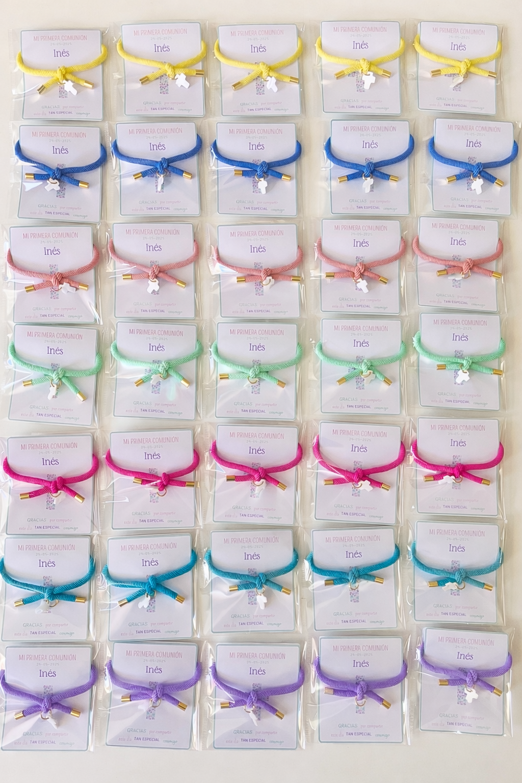 Pulsera solidaria nudo cruz nacarada