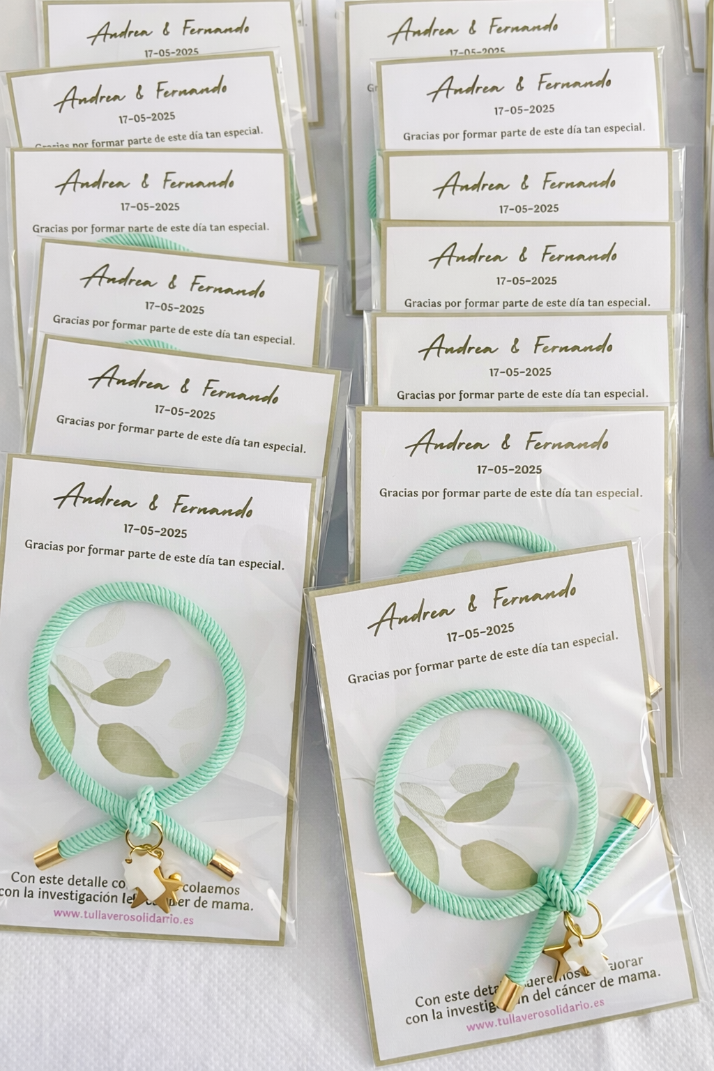 Pulsera solidaria nudo cruz nacarada