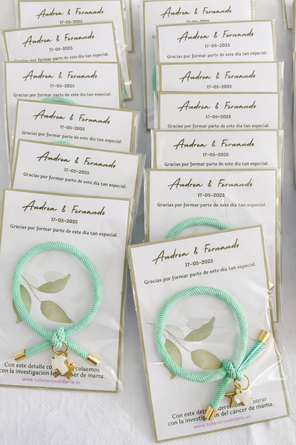 Pulsera solidaria nudo cruz nacarada